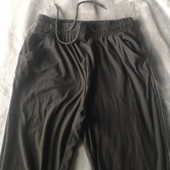 It’s black pants with white stripes. - Picture 1 of 2